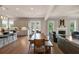 Open layout kitchen featuring white cabinets, stainless steel appliances, and breakfast bar seating at 3459 Clubland Dr, Marietta, GA 30068