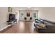 Spacious living room has hardwood floors, natural light, and modern furnishings at 3459 Clubland Dr, Marietta, GA 30068