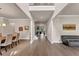 Open-concept living room with hardwood floors, high ceilings, and neutral paint at 3459 Clubland Dr, Marietta, GA 30068