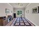 Comfortable office with natural lighting, wood floors, a ceiling fan, and a patterned area rug at 3459 Clubland Dr, Marietta, GA 30068