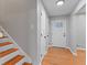 Inviting entryway with wood-look flooring, leading to stairs and the front door at 2002 Twin Falls Rd, Decatur, GA 30032
