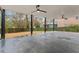 Large covered patio with ceiling fans, great for outdoor entertaining and relaxing at 2002 Twin Falls Rd, Decatur, GA 30032