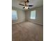 Bedroom with neutral carpet and dual windows at 2266 Eastgate Dr, Snellville, GA 30078