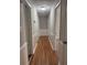 Hallway with hardwood flooring and white wainscoting at 2266 Eastgate Dr, Snellville, GA 30078
