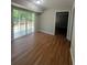 Living area with hardwood floors and sliding glass doors to the deck at 2266 Eastgate Dr, Snellville, GA 30078