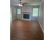 Cozy living room with brick fireplace and plenty of natural light at 2266 Eastgate Dr, Snellville, GA 30078