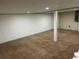 Spacious basement showcasing neutral carpet and ample wall space at 3551 Skyline Sw Ter, Marietta, GA 30008
