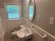Cozy bathroom features a pedestal sink, tiled walls, and natural light from a window at 3551 Skyline Sw Ter, Marietta, GA 30008