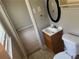 Compact bathroom with a single vanity, tiled floor, and a classic design at 3551 Skyline Sw Ter, Marietta, GA 30008