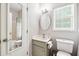 Bathroom featuring a vanity sink, toilet, and shower and bathtub combo at 4630 Smokestone Dr, Douglasville, GA 30135