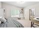 Comfortable bedroom featuring built-in storage, natural light, and stylish decor at 4630 Smokestone Dr, Douglasville, GA 30135