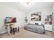 Nicely staged bedroom space with desk, shelves, and bright natural light at 4630 Smokestone Dr, Douglasville, GA 30135