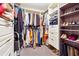 Well-organized walk-in closet featuring built-in shelving, hanging rods, and ample storage at 4630 Smokestone Dr, Douglasville, GA 30135