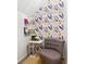 Cozy closet nook showcasing stylish wallpaper, furniture, and natural light at 4630 Smokestone Dr, Douglasville, GA 30135