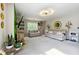 Spacious living room with carpet, sofas, a TV, and ample natural light at 4630 Smokestone Dr, Douglasville, GA 30135