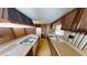 Classic mobile home kitchen with wood cabinets at 85 Lang Cir, Covington, GA 30014