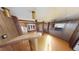 Open living room with wood paneling at 85 Lang Cir, Covington, GA 30014