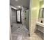 Clean shower and bathroom area with modern fixtures, tile flooring, and neutral decor creating a refreshing spa-like experience at 1503 Wingate Way # 1503, Sandy Springs, GA 30350