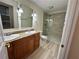 Updated bathroom with granite counters, double sinks and glass shower at 1503 Wingate Way # 1503, Sandy Springs, GA 30350