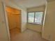 Walk-in closet with window and shelving system for organization at 1503 Wingate Way # 1503, Sandy Springs, GA 30350