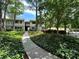 Inviting two-story home with lush landscaping and a charming walkway, perfect for a peaceful retreat at 1503 Wingate Way # 1503, Sandy Springs, GA 30350