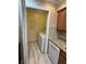 Convenient laundry room with new appliances and storage, adding to the functionality of the home at 1503 Wingate Way # 1503, Sandy Springs, GA 30350