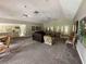 Expansive resident lounge featuring comfortable seating areas and a well-equipped kitchen for community gatherings and relaxation at 1503 Wingate Way # 1503, Sandy Springs, GA 30350