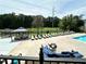 Relaxing pool area with lounge chairs and a gazebo for sunny days and enjoyment at 1503 Wingate Way # 1503, Sandy Springs, GA 30350