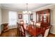 Traditional dining room with hardwood floors, a wooden table and furniture at 1560 Boxwood Nw Trce, Acworth, GA 30102