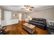 Comfortable living room with hardwood floors and a view into an adjacent room at 1560 Boxwood Nw Trce, Acworth, GA 30102