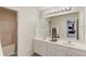 Bathroom features large mirror, double sinks, and a shower behind the door at 2990 Haynes Club Cir, Grayson, GA 30017