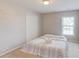 Minimalist bedroom with a double bed and a double door closet at 2990 Haynes Club Cir, Grayson, GA 30017