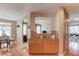 Open floor plan with dining area, a serving counter and access to both the living room and a dining room at 2990 Haynes Club Cir, Grayson, GA 30017