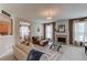 Cozy living room with a fireplace, comfortable seating, and a welcoming atmosphere at 2990 Haynes Club Cir, Grayson, GA 30017