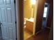 Half bathroom featuring a single vanity and lighting at 8202 Fairington Village Dr, Lithonia, GA 30038