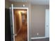 Neutral hallway with brown carpet at 8202 Fairington Village Dr, Lithonia, GA 30038