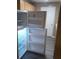 Kitchen featuring an open refrigerator at 8202 Fairington Village Dr, Lithonia, GA 30038