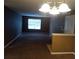 A cozy living room featuring neutral tones and a bright window, perfect for relaxing or entertaining guests at 8202 Fairington Village Dr, Lithonia, GA 30038