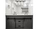 Bathroom features a double sink vanity with gray cabinets and contemporary lighting at 1150 Collier Nw Rd # K9, Atlanta, GA 30318