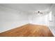 Bright living room featuring hardwood floors, a ceiling fan, and plenty of natural light at 1150 Collier Nw Rd # K9, Atlanta, GA 30318