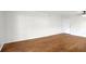 Empty living room boasting hardwood floors, a ceiling fan, and a neutral color palette at 1150 Collier Nw Rd # K9, Atlanta, GA 30318