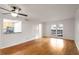 Spacious living room with hardwood floors, bright lighting, and access to an outdoor area at 1150 Collier Nw Rd # K9, Atlanta, GA 30318