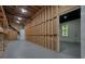Unfinished basement area with gray concrete floors and stairway access at 3427 Mill Stream Sw Ln, Marietta, GA 30060