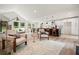 Spacious open concept living room with eat-in kitchen, hardwood flooring, and plenty of natural light at 3427 Mill Stream Sw Ln, Marietta, GA 30060
