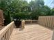 Wide wooden deck offering tranquil treetop views for the perfect outdoor relaxation spot at 3988 Church View Ln, Suwanee, GA 30024
