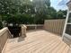 Spacious wooden deck perfect for relaxing, surrounded by lush greenery and an inviting outdoor space at 3988 Church View Ln, Suwanee, GA 30024