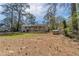 Spacious backyard with lots of potential, perfect for outdoor activities and entertaining at 80 Crystal River Dr, Riverdale, GA 30274