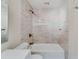 Neutral-toned bathroom features a tub, shower, and updated dark bronze fixtures at 80 Crystal River Dr, Riverdale, GA 30274