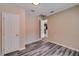Neutral bedroom with new gray vinyl floors and white trim at 80 Crystal River Dr, Riverdale, GA 30274
