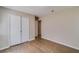 Neutral-toned bedroom with refinished floors and ample closet space at 80 Crystal River Dr, Riverdale, GA 30274